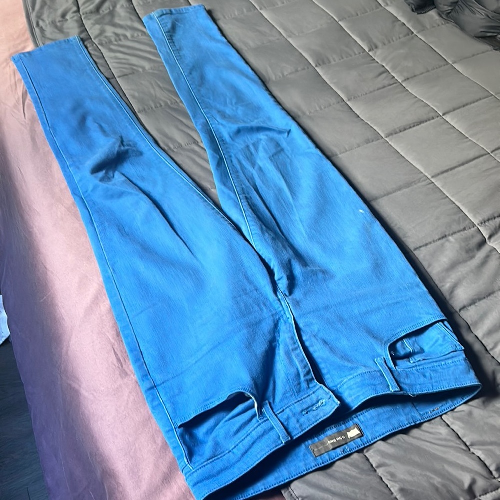 Bright blue high waisted Levi jeans